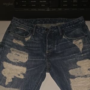 Distressed Blue Jeans